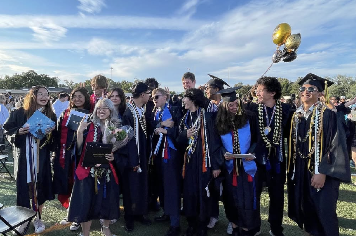 Sofie with her high school friends at graduation celebrating 