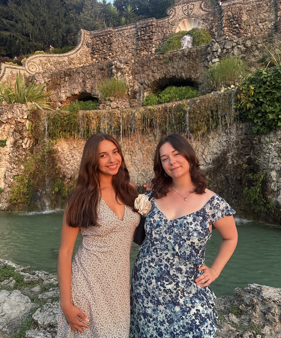 Sofie is posing with one of her best friends in front of water in Florence, Italy.